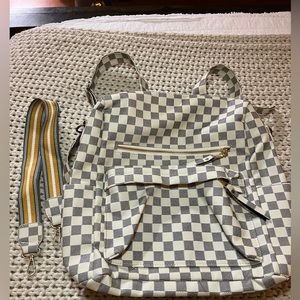 Grey and white checkered backpack